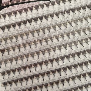 Premade volume eyelash extension book of 500 fans each book.